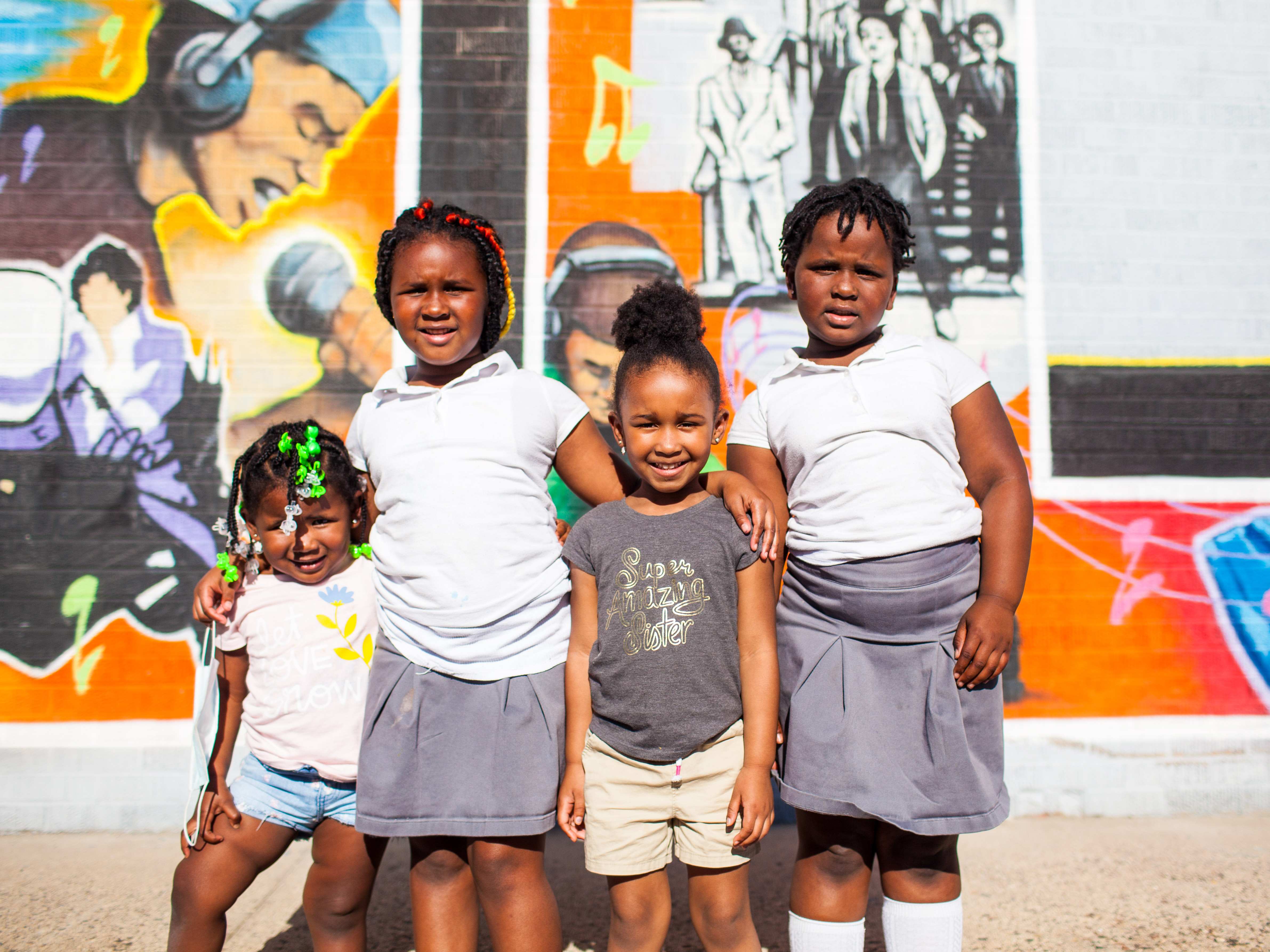 Kiddos Kiddos in front of wall