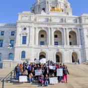 Group of people in front of State Capitol