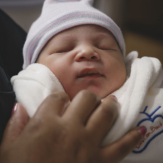 Baby and mother's hand