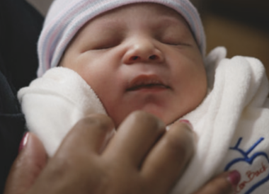 Baby and mother's hand