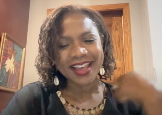 Woman looking into camera speaking