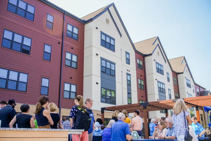 People gathered around Emerson Village
