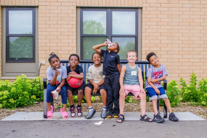 Children sitting on a bench